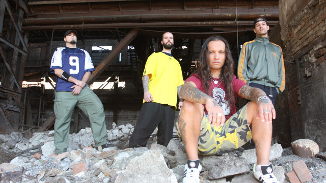 Men standing building rubble rocks free wallpaper for desktop - medium preview image