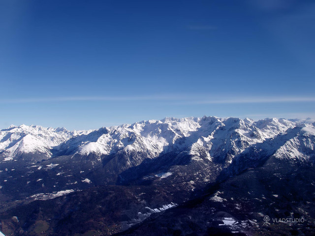Mountain range airplane window blue #3 free wallpaper for desktop - medium preview image