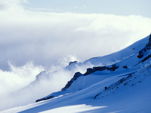 Skiing clouds mountain person snowy free wallpaper for desktop - medium preview image