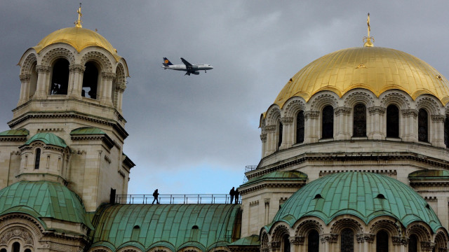 Plane cathedral cloudy golden dome free wallpaper for desktop - medium preview image