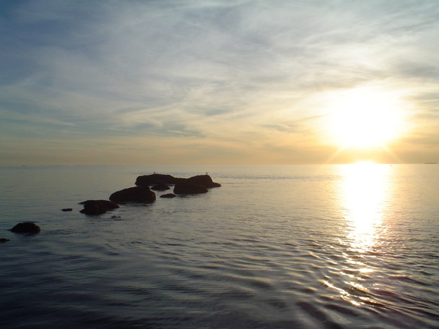 Water rocks sun clouds distance free wallpaper for desktop - medium preview image