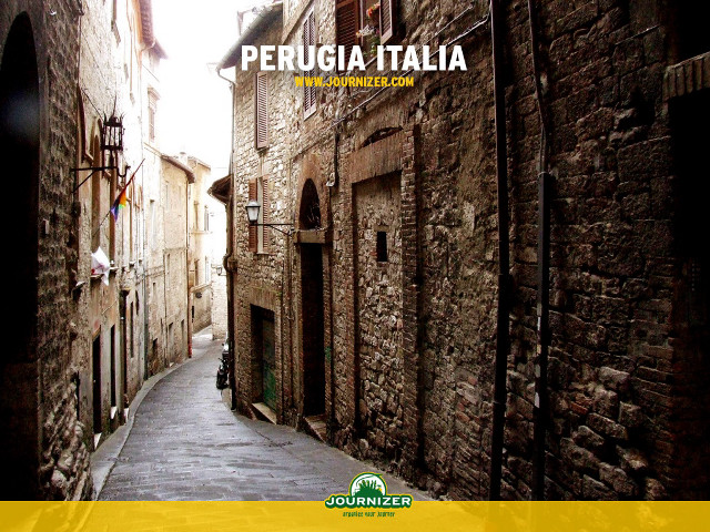 Narrow alley cobblestone street buildings free wallpaper for desktop - medium preview image