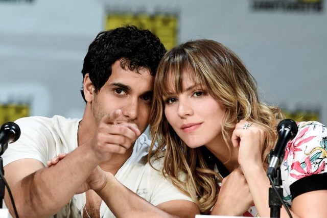 Man woman sitting table microphones free wallpaper for desktop - medium preview image