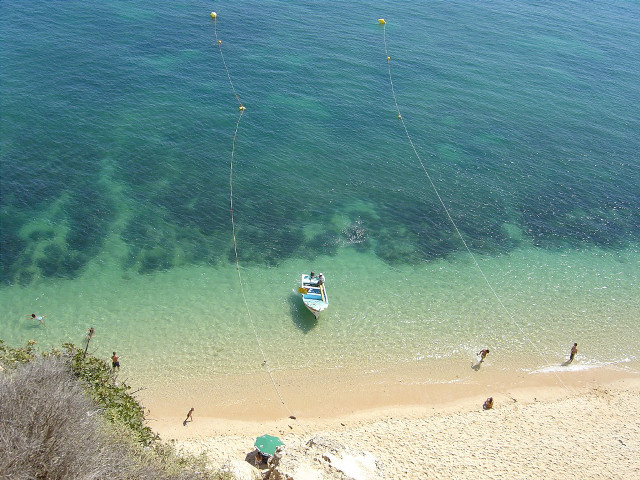 Boat tied rope beach people free wallpaper for desktop - medium preview image
