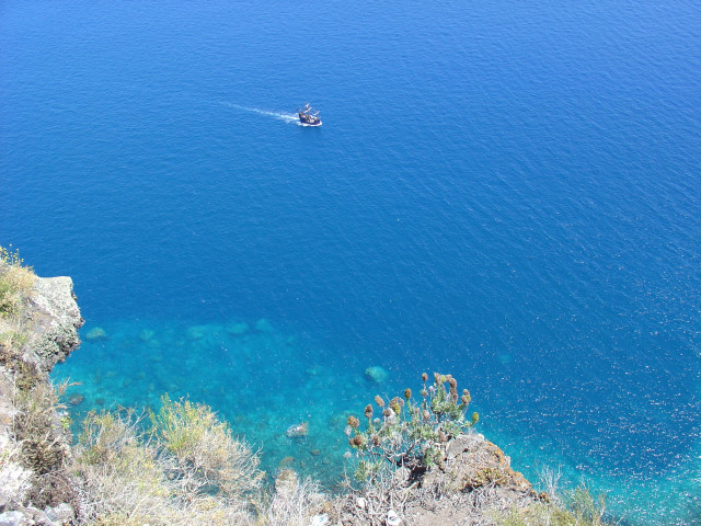 Boat cliff ocean water blue #2 free wallpaper for desktop - medium preview image