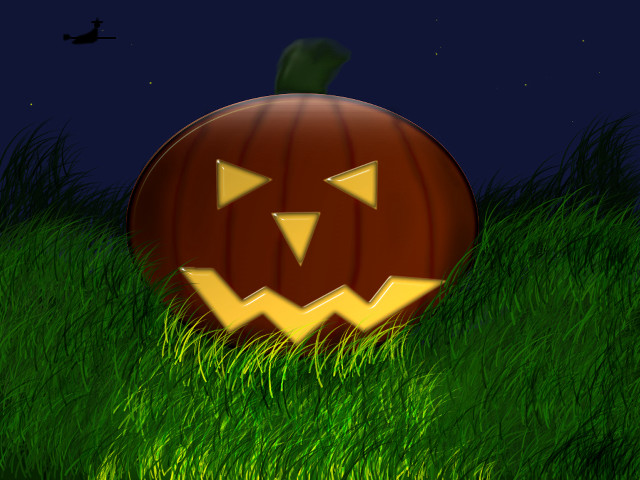 Pumpkin carved face grass night free wallpaper for desktop - medium preview image