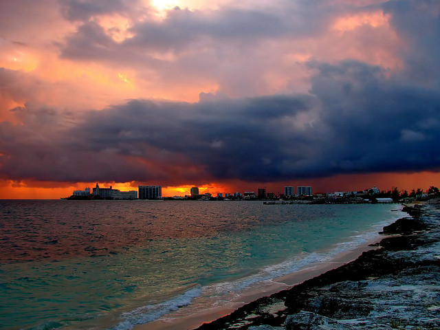 Sunset beach city clouds water free wallpaper for desktop - medium preview image