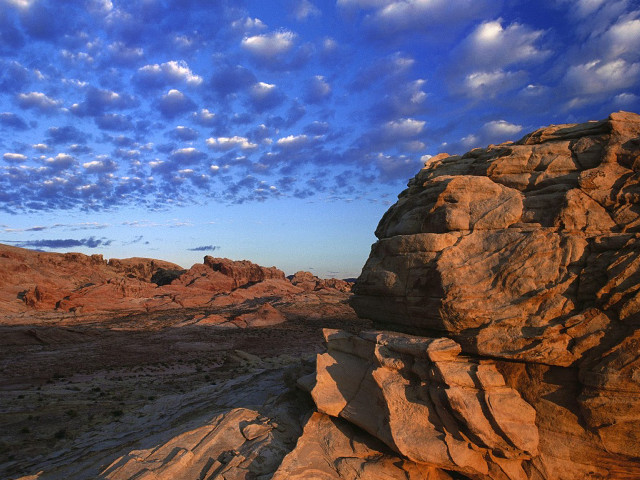 Rocky outcropping blue sky clouds free wallpaper for desktop - medium preview image