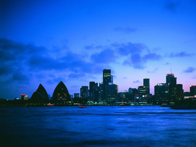 City skyline boat dusk blue #3 free wallpaper for desktop - medium preview image