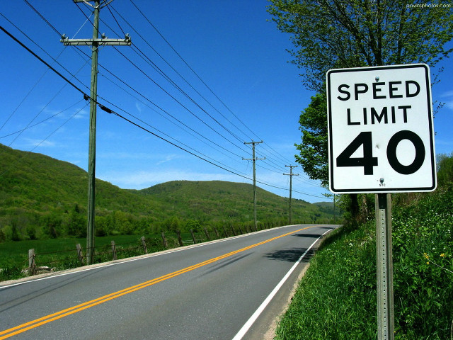 Speed limit sign hill trees free wallpaper for desktop - medium preview image