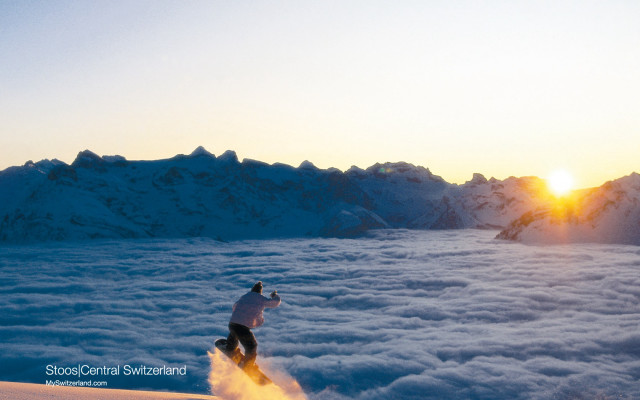 Skiing sunset mountain clouds distance free wallpaper for desktop - medium preview image