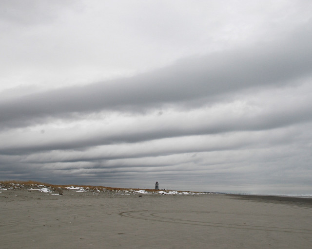 Kite beach cloudy lighthouse person #2 free wallpaper for desktop - medium preview image
