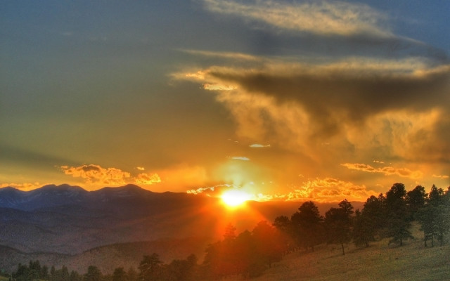 Sunset mountain clouds trees hills free wallpaper for desktop - medium preview image