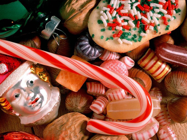 Candy canes pile holiday sweets free wallpaper for desktop - medium preview image