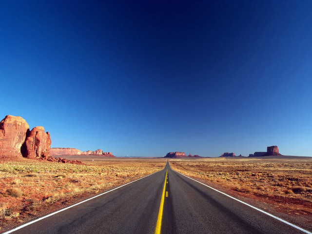 Long road yellow line desert free wallpaper for desktop - medium preview image
