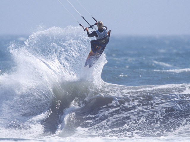 Man riding wave surfboard ocean #23 free wallpaper for desktop - medium preview image