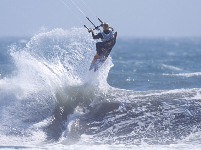 Man riding wave surfboard ocean #24 free wallpaper for desktop - medium preview image