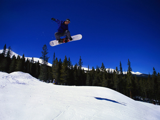 Man flying snowboard slope forest #2 free wallpaper for desktop - medium preview image