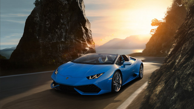 Blue sports car mountain range free wallpaper for desktop - medium preview image