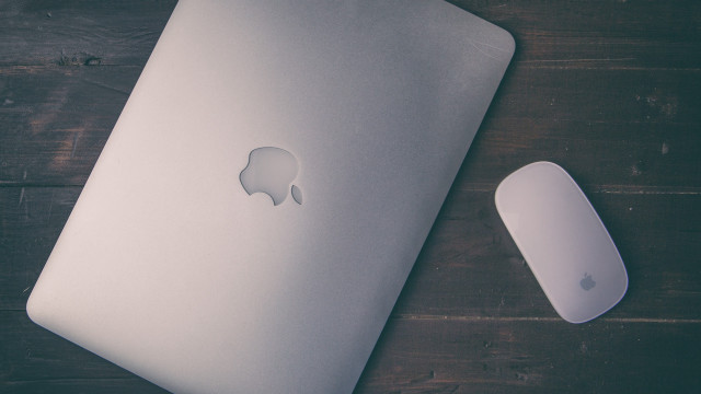 White apple laptop wooden table free wallpaper for desktop - medium preview image