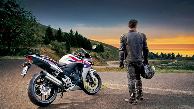 Man motorcycle road sunset time free wallpaper for desktop - medium preview image