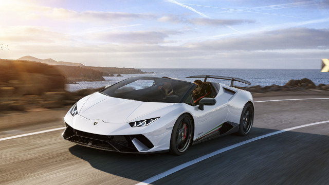White sports car ocean cliff free wallpaper for desktop - medium preview image