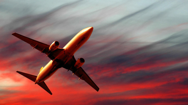 Plane flying red blue sky free wallpaper for desktop - medium preview image