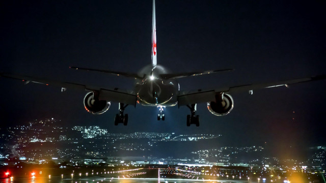 Jetliner night city lights flying free wallpaper for desktop - medium preview image
