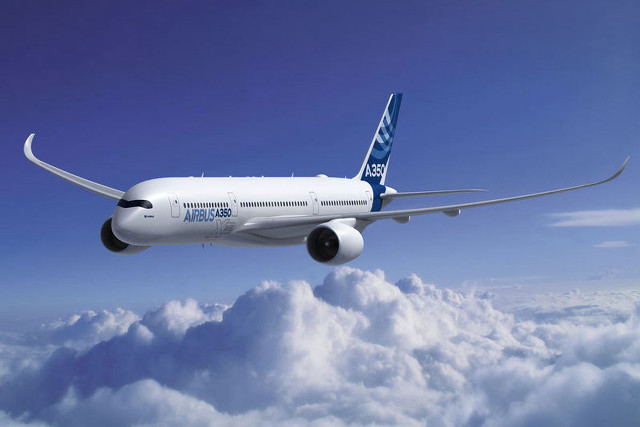 Large jetliner flying blue sky #2 free wallpaper for desktop - medium preview image