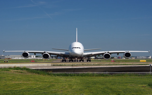 Jetliner airport runway grass fence free wallpaper for desktop - medium preview image