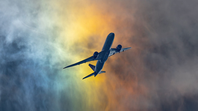 Plane flying sky rainbow clouds free wallpaper for desktop - medium preview image