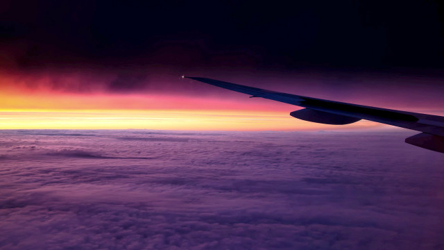 Airplane wing sunset clouds ocean free wallpaper for desktop - medium preview image