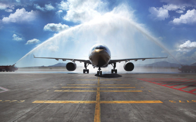 Jet runway skyline mountain ocean free wallpaper for desktop - medium preview image