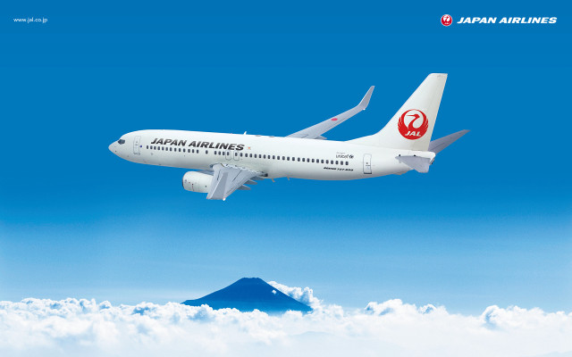 Japan airlines plane clouds mountain free wallpaper for desktop - medium preview image