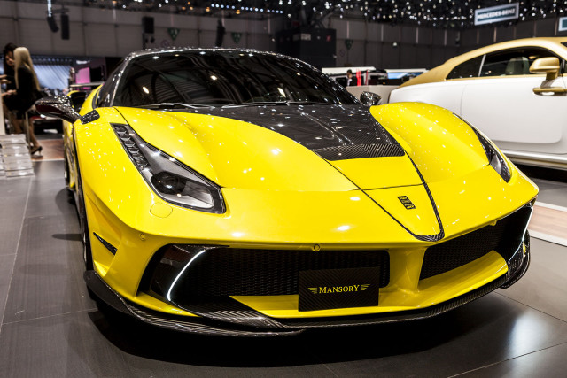 Yellow sports car showroom display free wallpaper for desktop - medium preview image