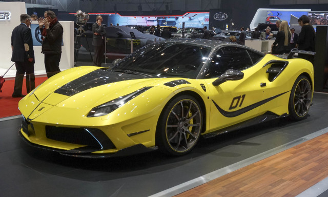 Yellow sports car display people free wallpaper for desktop - medium preview image