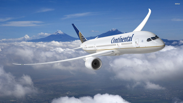 Airplane flying sky clouds mountains free wallpaper for desktop - medium preview image