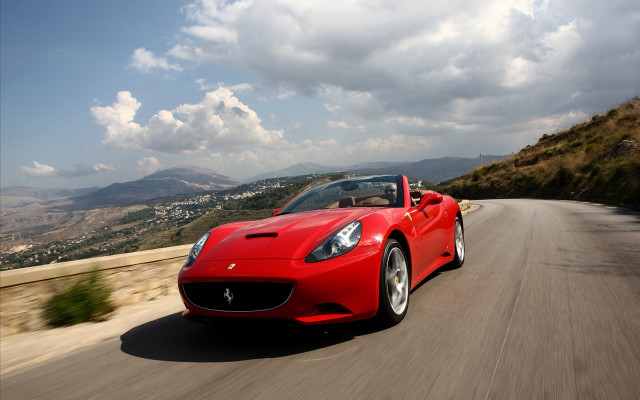 Red sports car driving road #15 free wallpaper for desktop - medium preview image