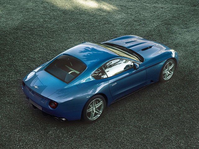 Blue sports car grass field #2 free wallpaper for desktop - medium preview image