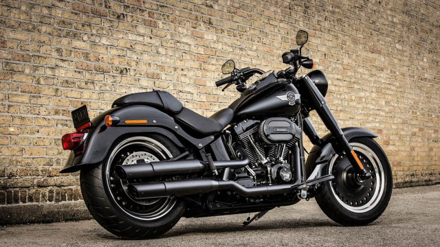 Black motorcycle brick wall building free wallpaper for desktop - medium preview image