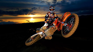 Man dirt bike sunset sky - a dirt bike free wallpaper