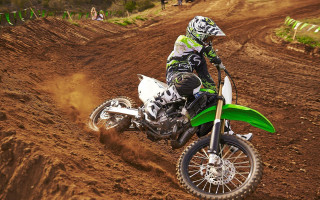 Dirt bike rider track spectators - a dirt track in the dirt free wallpaper