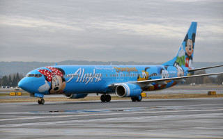 Blue airplane mickey runway mountains - a mickey mouse free wallpaper