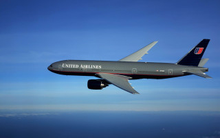 Jetliner flying blue sky ocean - u free wallpaper