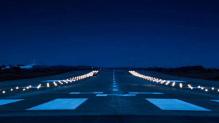 Long road night lights plane - a plane in the distance free wallpaper for desktop