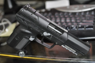 Gun desk keyboard mouse blurry - top of a desk next free wallpaper