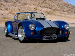 Blue sports car mountain cobra - a mountain in the background free wallpaper