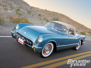 Blue car driving road hillside - a hill side free wallpaper