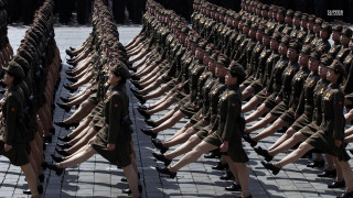 Uniformed group marching formation street - kitsch movement free wallpaper