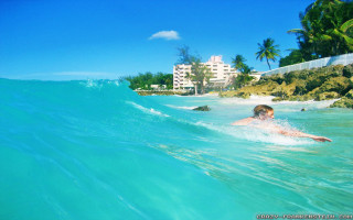 Man riding wave surfboard ocean 2 - a wave free wallpaper for desktop